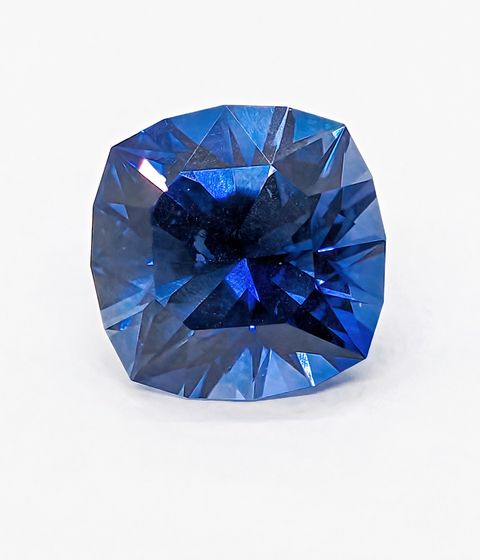 Blue sapphire gemstone on a white background